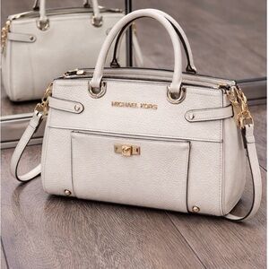 White Satchel with gold hardware and red lining/ Elegant and timeless